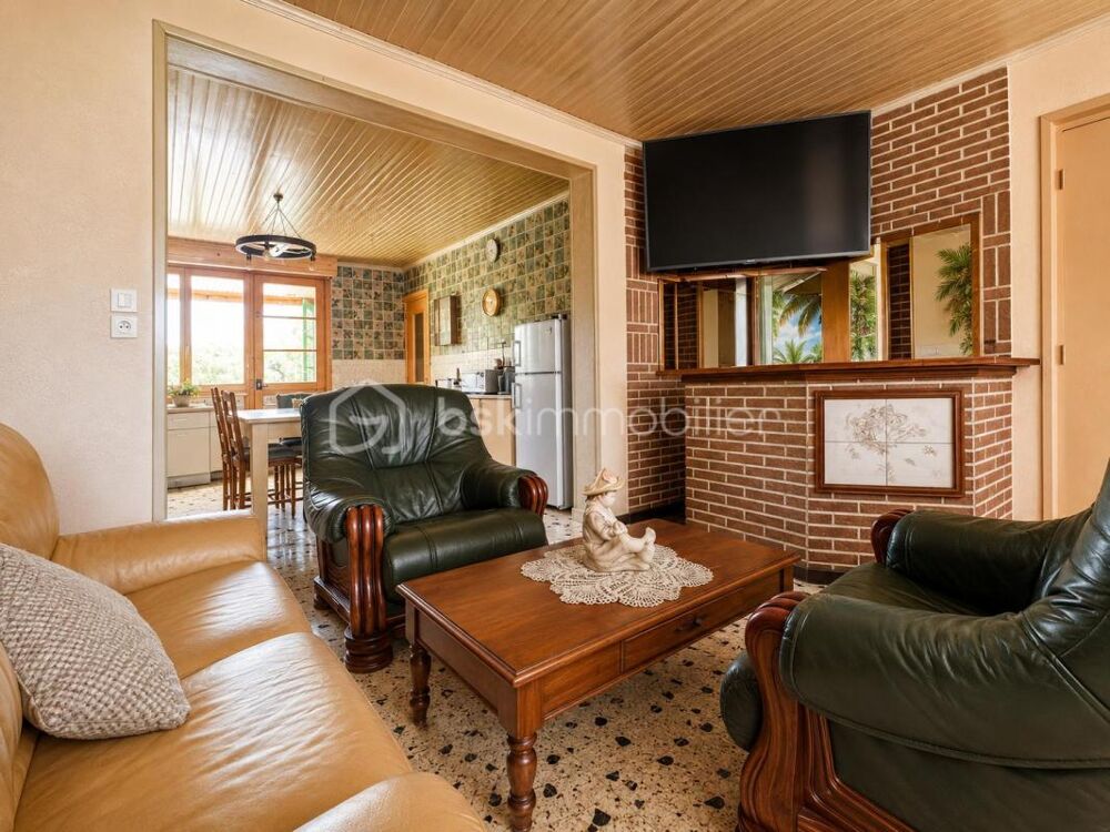 Maison individuelle 105 m²  3 chambres  Garage en sous-sol  Jardin