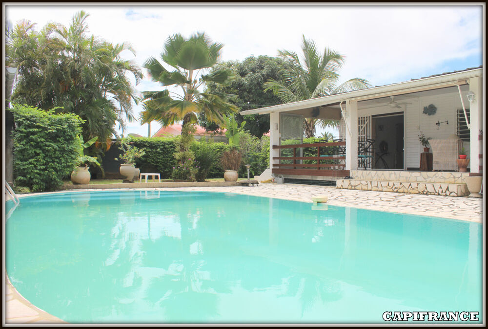 A VENDRE A KOUROU (97310) UNE MAGNIFIQUE MAISON EN BOIS T5 de 106 m² AVEC 2 MAISONS T2 INDEPENDANTES - TERRAIN DE 775 m² - AU PR