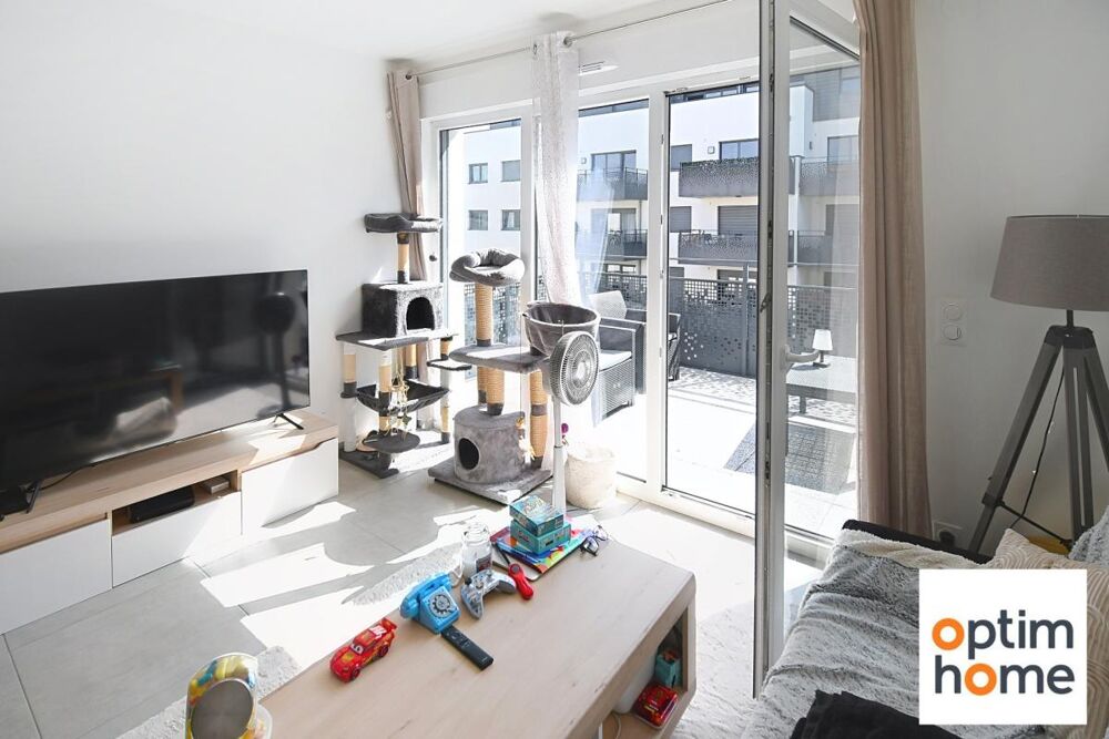 APPARTEMENT PLAIN PIED 50M2 ENVIRON - TERRASSE - PLACE DE PARKING PRIVATIVE - VENDU MEUBLE