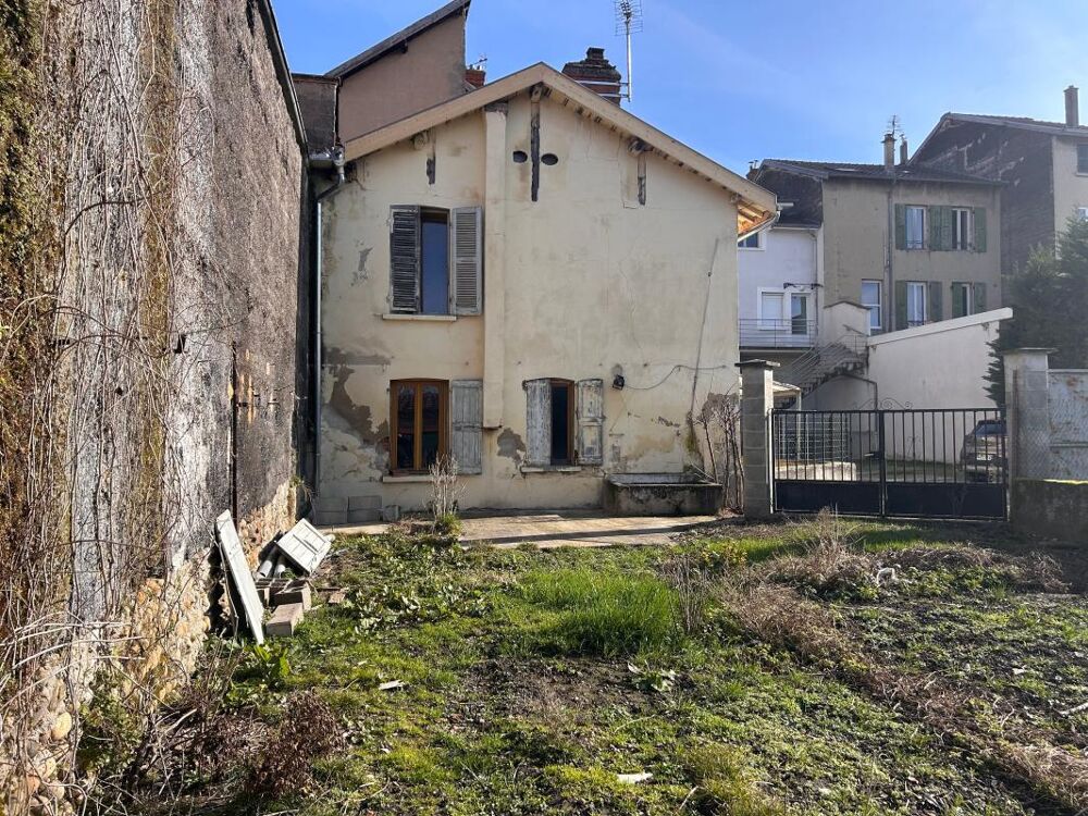 Maison avec terrain et garage à 2 pas du centre