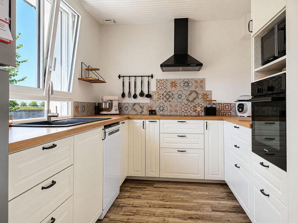 Maison sur sous-sol 4 chambres avec dépendance - VERNANTES (49390)