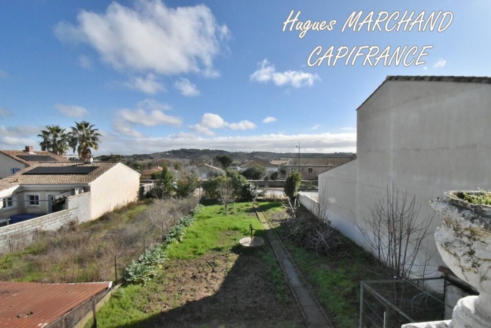 Maison vigneronne avec garage, cour et jardin  Fort potentiel