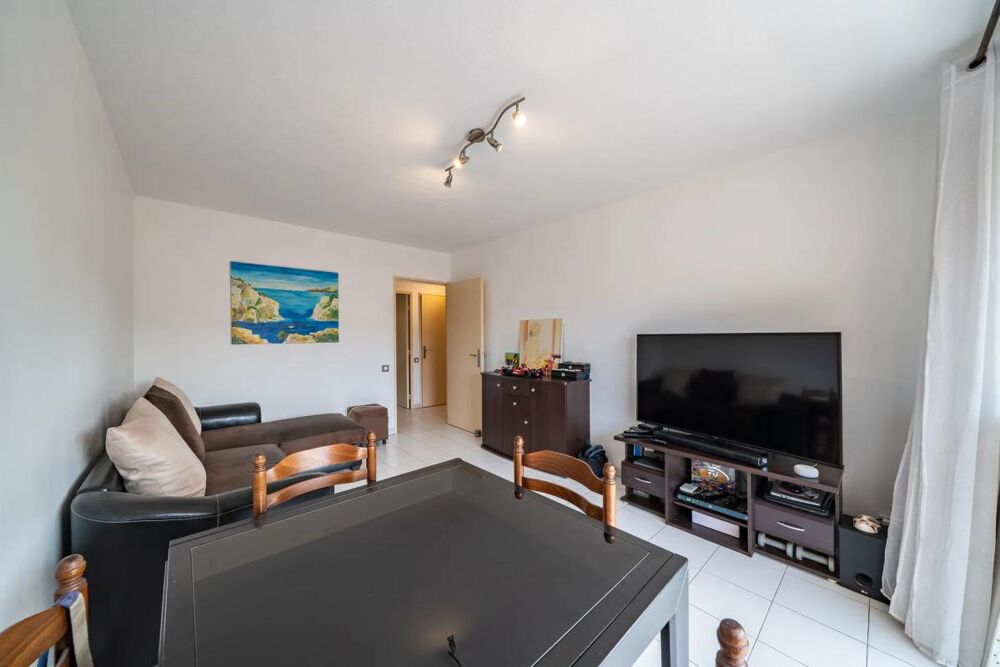2P TRAVERSANT 44,7 M²  DOUBLE TERRASSE  STATIONNEMENT PRIVATIF