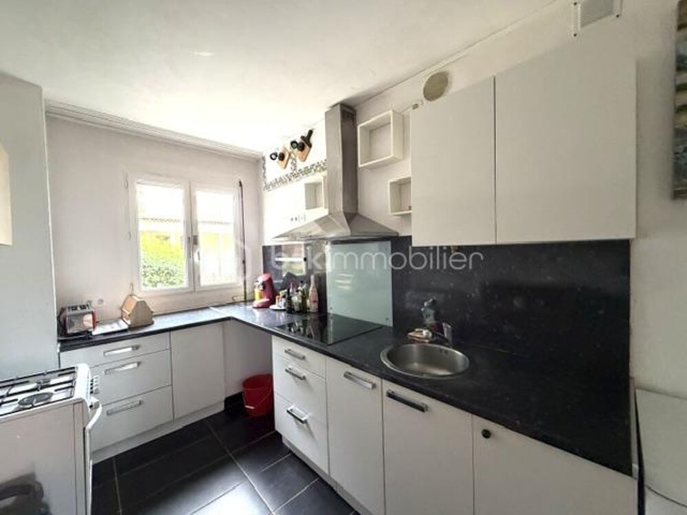 appartement spacieux avec cave, balcon et place de parking
