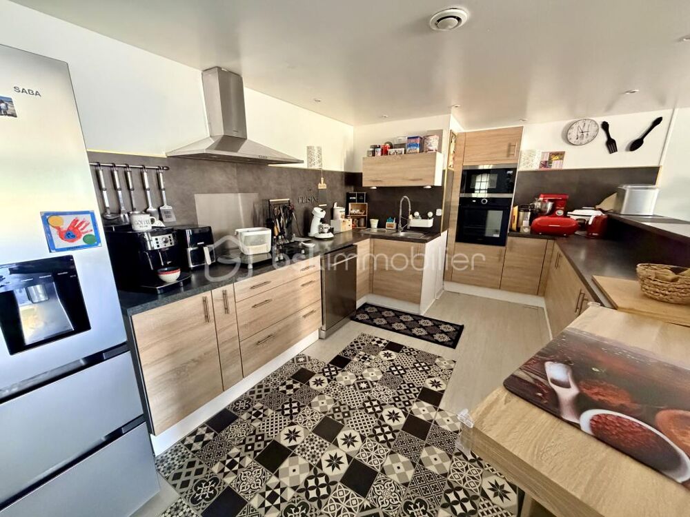 Maison mitoyenne de plain-pied de 95 m² avec terrasse à découvrir