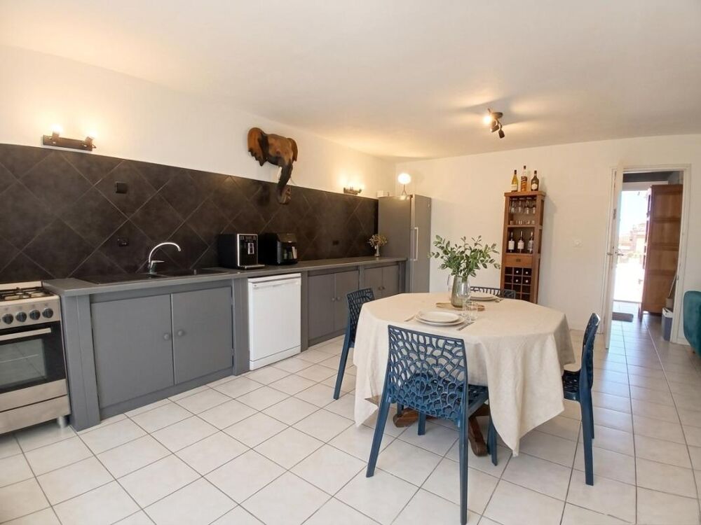 Maison plain-pied 4 chambres avec terrasse et jardin