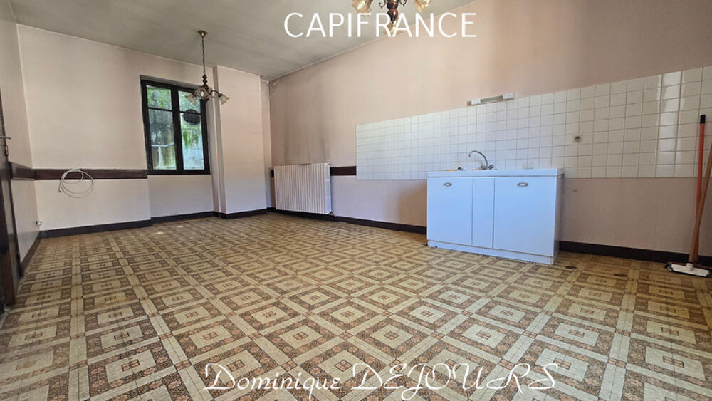 Maison composée de 2 appartements (57 et 43m²) et d'un grand garage de 100m²