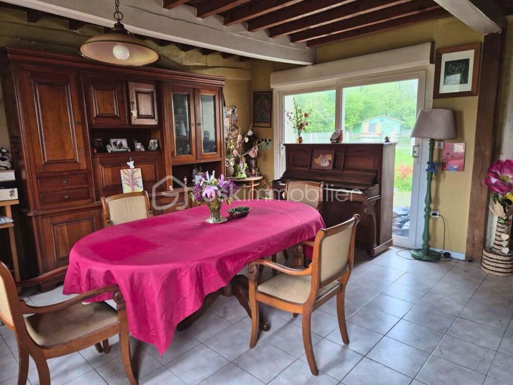 Maison de plain  pied à fort potentiel  Terrain 5000 m²  Dépendance  Grange  Garages  Cave  Piscine  Environnement calme