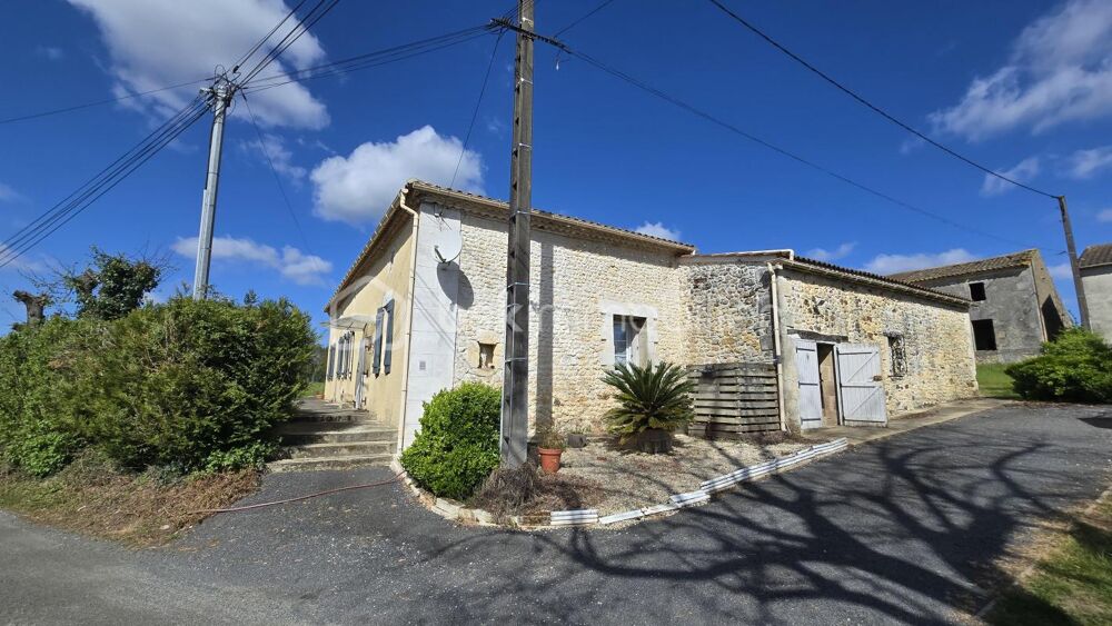 Maison en pierre avec 100m2 de dépendances