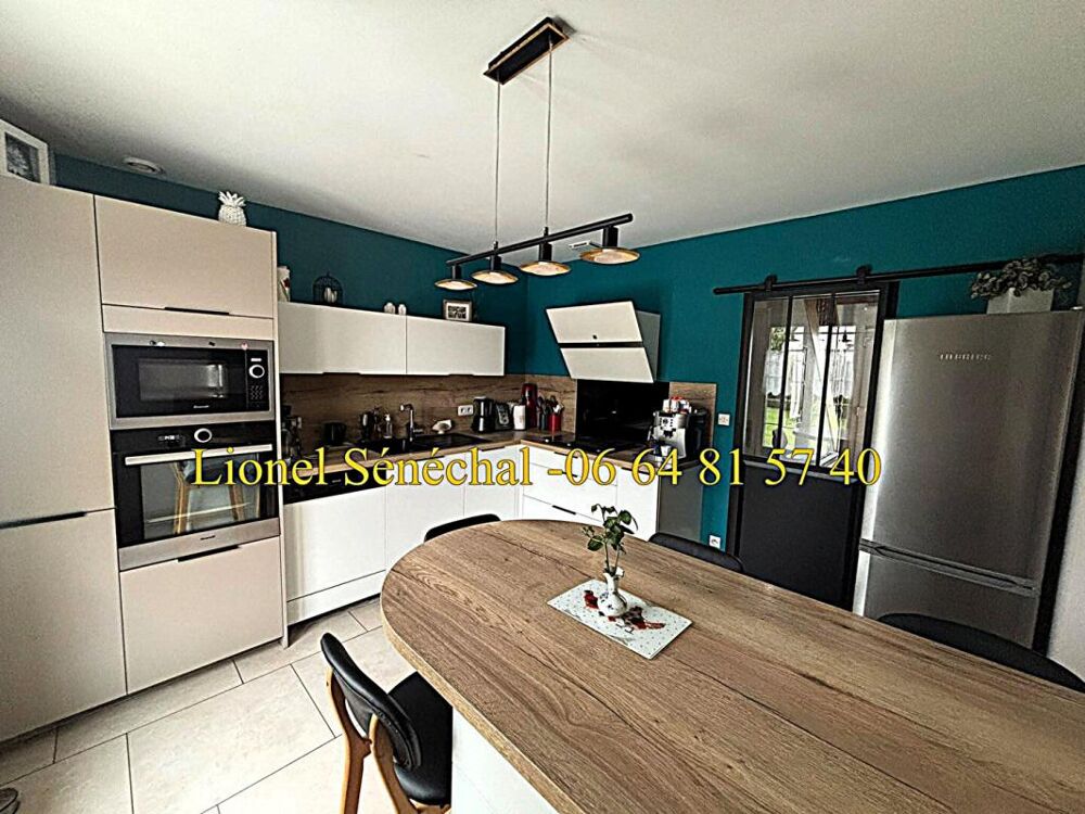 Vente Maison Maison lumineuse et peu énergivore 9 pièces de 138 m2 habitables (165 m2 au sol) sur une parcelle de plus de 1 200 m2 Laigne en belin