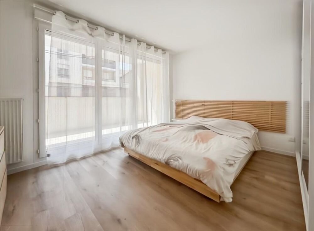 Appartement 3 pièces de 71 m2 avec jardin et 2 places de stationnement en sous-sol
