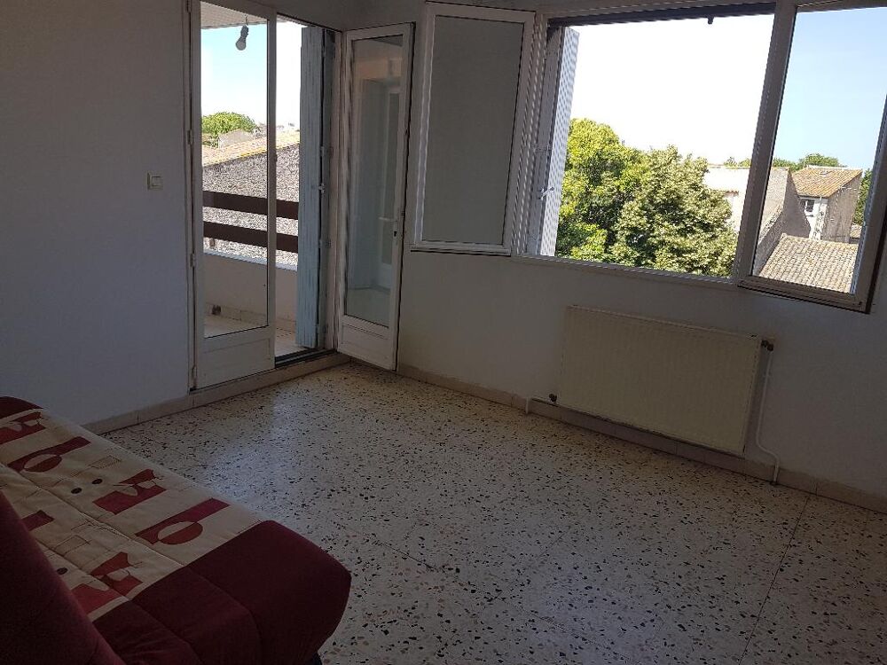 Appartement type 2 - dans immeuble proche du centre ville - quartier calme -