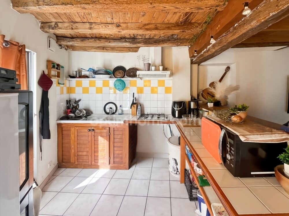 CHARMANTE MAISON DE VILLAGE LOUEE A MEZIN 111 M² 4 PIECES