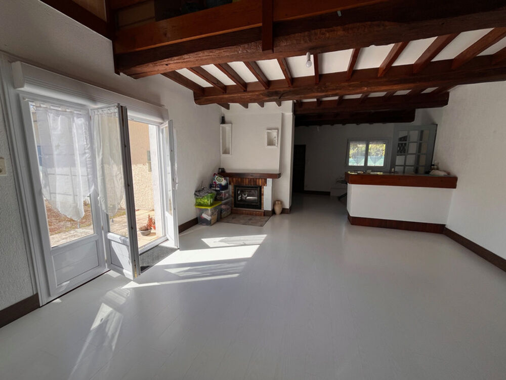 Maison familiale atypique avec grand garage attenant