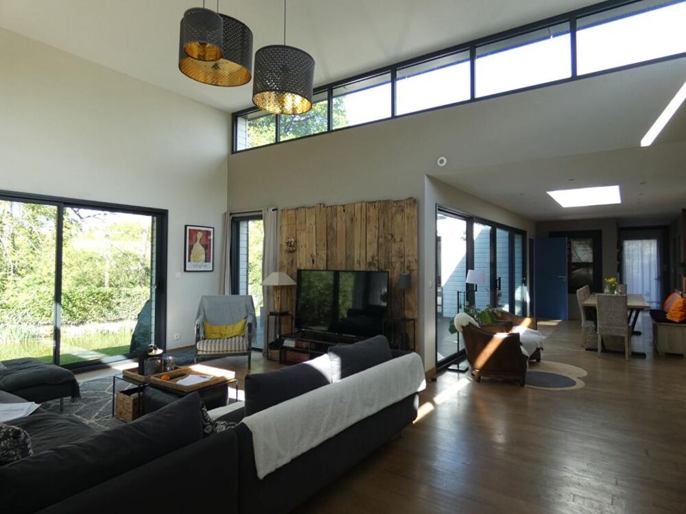 Magnifique maison d'architecte de 150m2 avec son gîte de 53m2, sur un terrain de 2 369m2