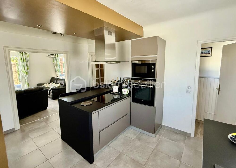 Maison familiale de 130 m² habitables avec jardin arboré de 757m² et piscine