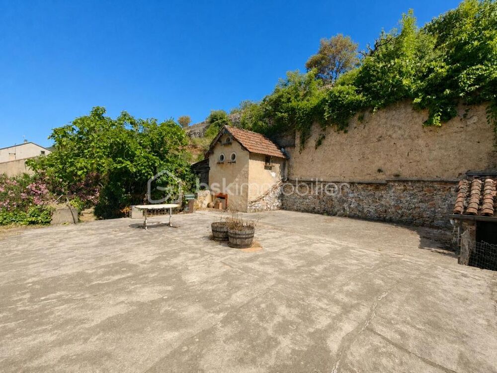 MAISON DE VILLAGE AVEC TERRAIN - TERRASSE ET GRAND GARAGE