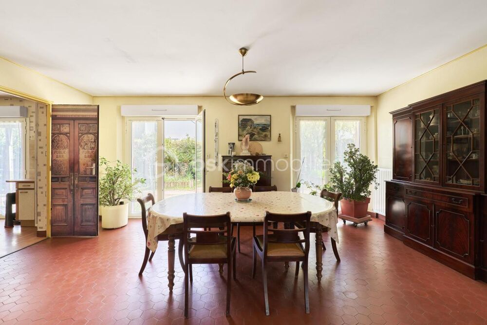 Maison familiale 7 pièces en impasse  Grand terrain de 1340 m², véranda et volumes généreux à Saint-Grégoire