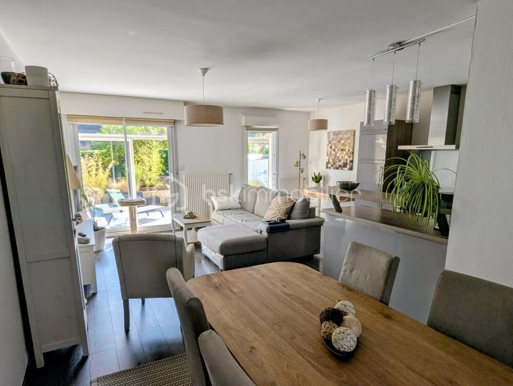 Appartement en RDC avec un grand balcon / extérieur et garage situé à FOUGERES 35300