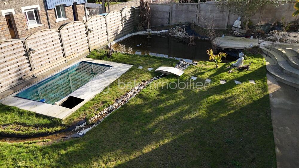 Maison sur sous sol aménagé bénéficiant d'un grand garage attenant
