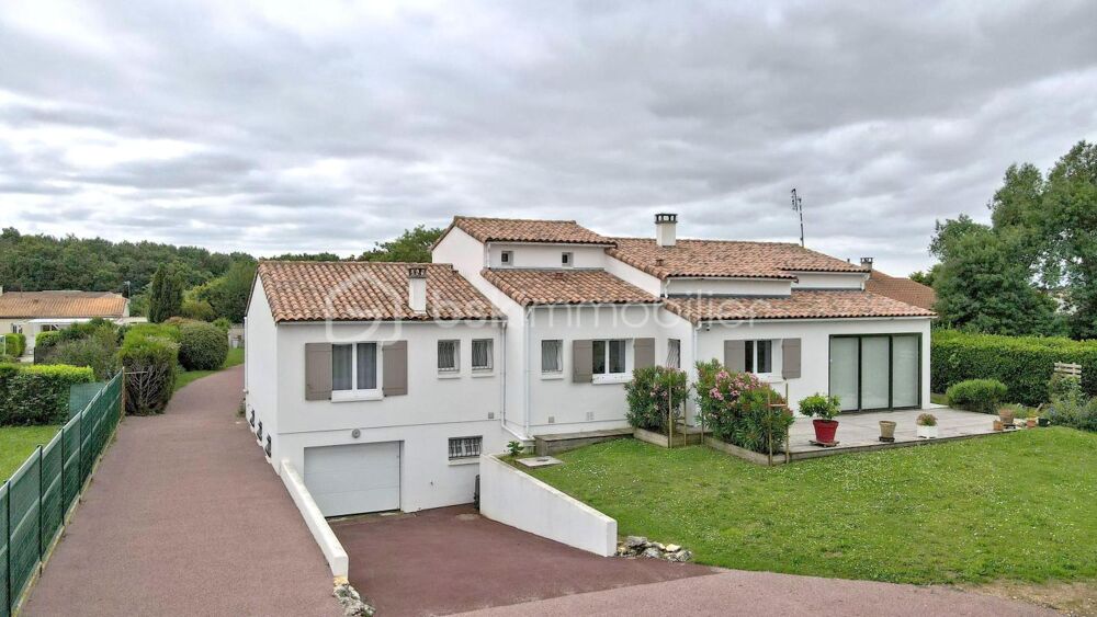 Maison familiale lumineuse, 4 chambres, garage, parc arboré, à proximité des commerces et à 15 min de locéan
