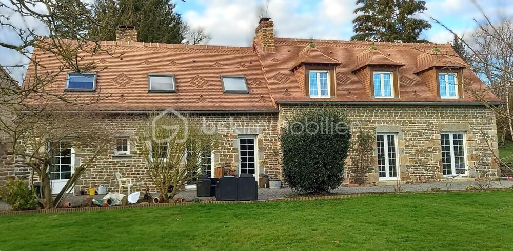 Magnifique longère en pierres sur un terrain arboré de 1801 m2