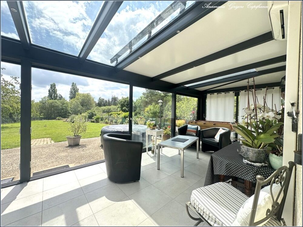 Vente Maison Courville-sur-Eure, belle maison de 193 m², 4 chambres, véranda, garages - 1926 m² de terrain Courville sur eure