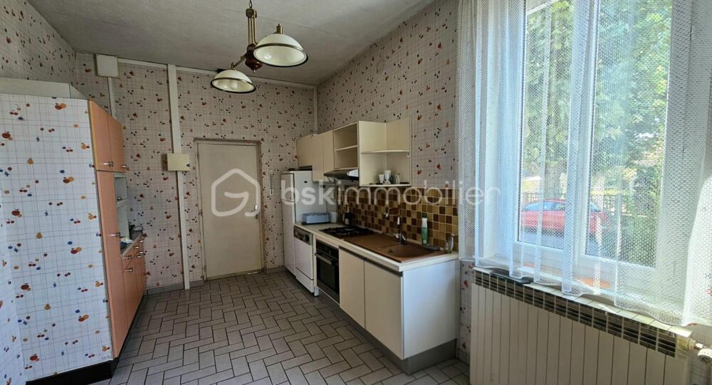 Maison de plain-pied avec sous-sol complet, garage et terrain  Fort potentiel à Roanne - particuliers ou professionnels pour di