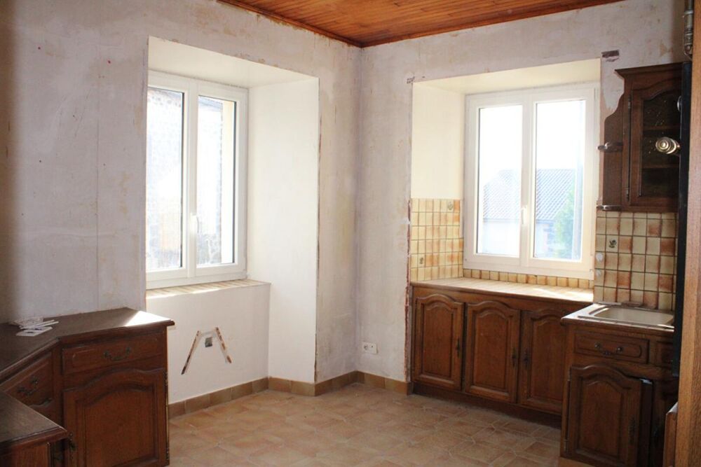 Maison Landos 6 pièce(s) 103 m2 garage, cour et atelier