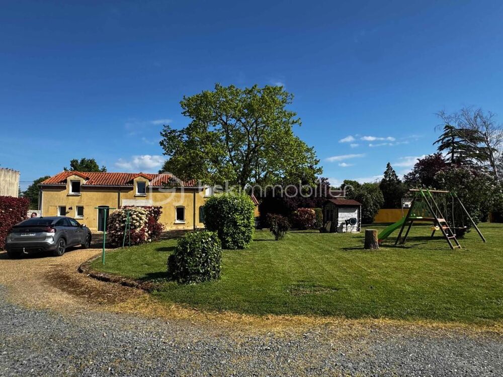 Maison avec logement indépendant loué, dépendances et terrain de 2 363 m²