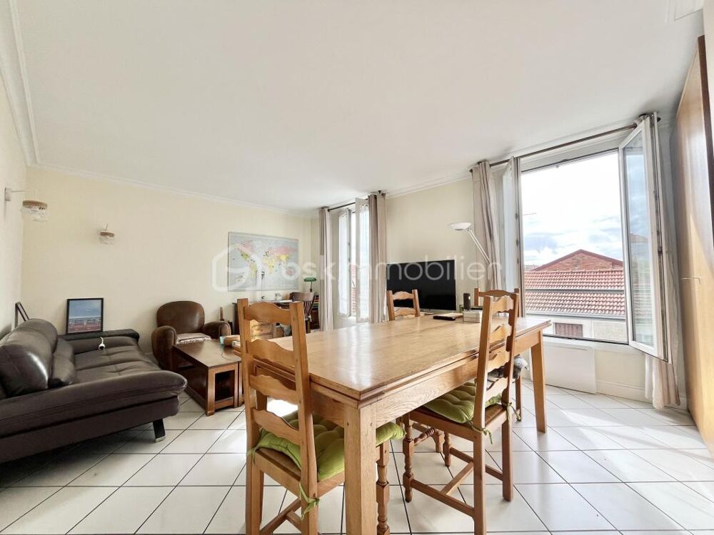 Appartement 3 pièces de 71 m²  Bas-Montreuil  Deux caves - Charme de lancien