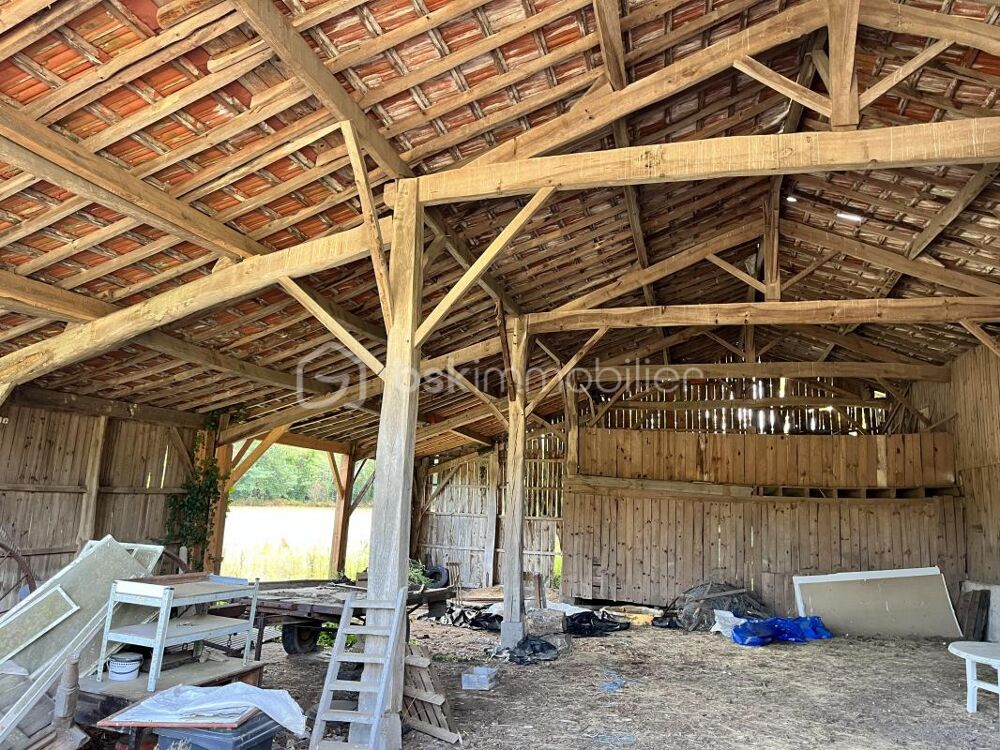 Batisse en pierres avec grange à rénover