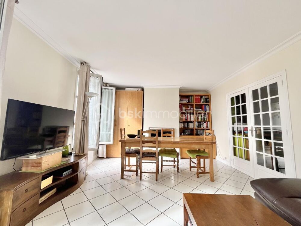 Appartement 3 pièces de 71 m²  Bas-Montreuil  Deux caves - Charme de lancien