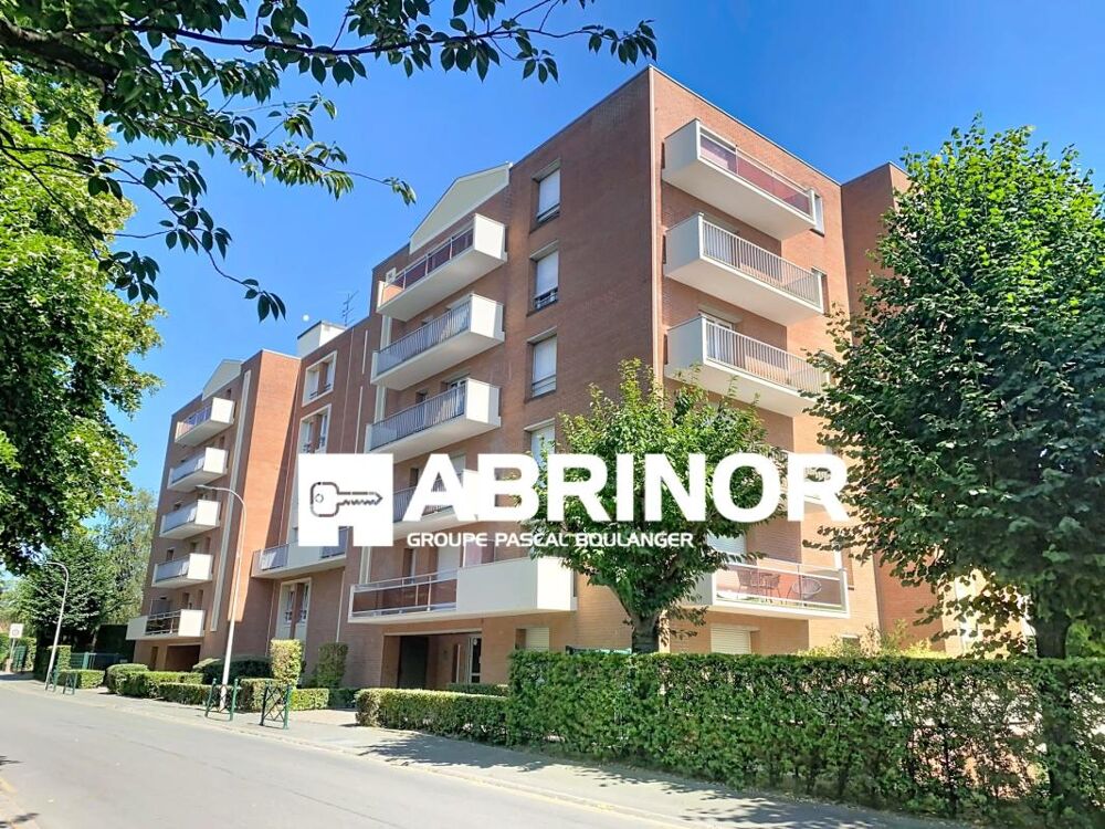 Appartement de type 2 en rez-de-jardin- terrasse- place de parking-cave
