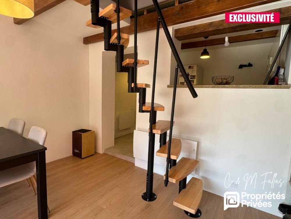 Ensemble immobilier avec appartement rénové - TRAVAILLAN - 220m²