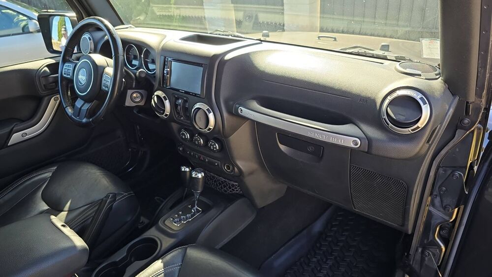 Wrangler 2.8 CRD 200 4WD BVA6 Sahara 2017 occasion 37230 Fondettes