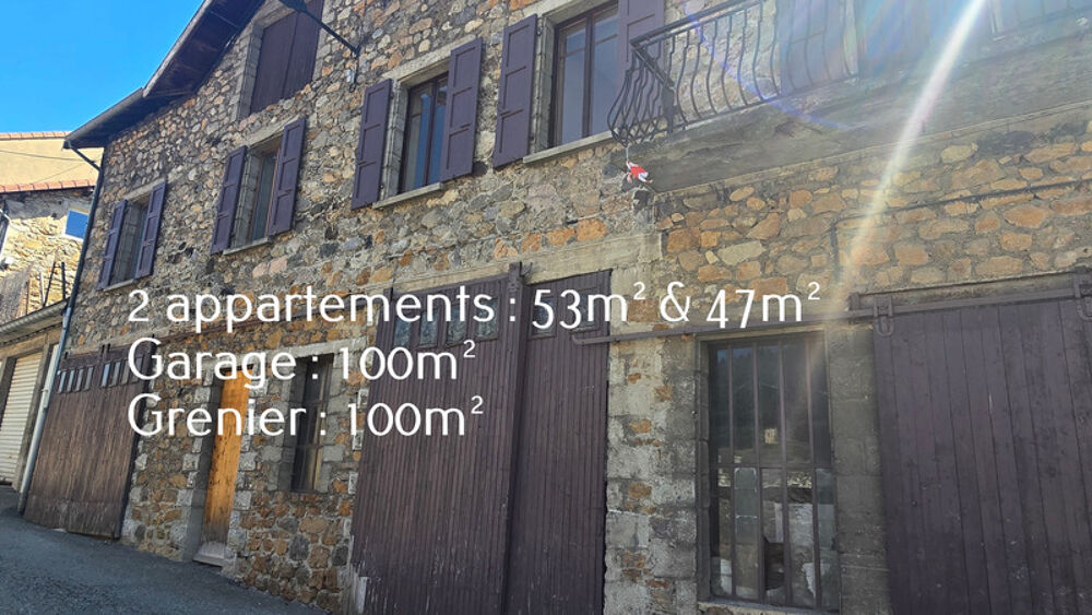 Maison composée de 2 appartements (57 et 43m²) et d'un grand garage de 100m²