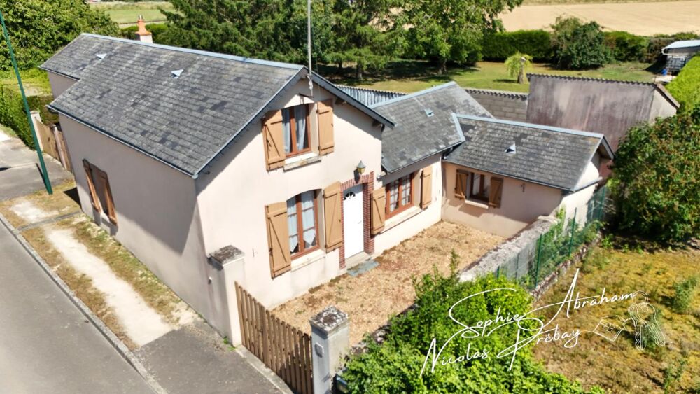 Maison avec dépendances et terrain constructible à Toury