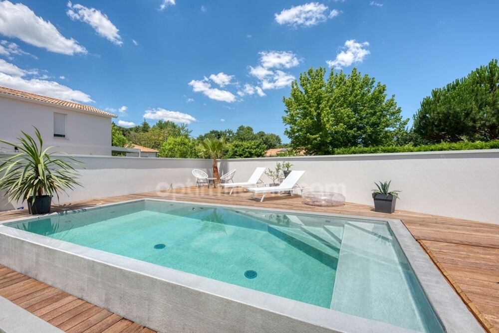 Maison familiale avec piscine à débordement  Cadre privilégié aux portes de Bordeaux (33)