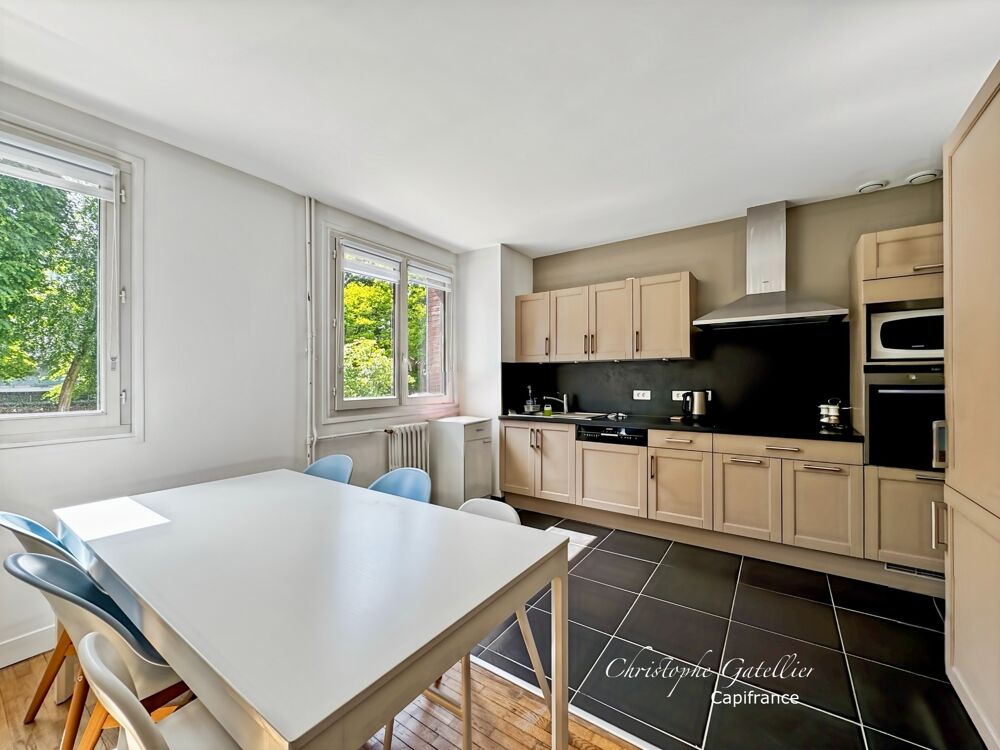 96 m²  3 chambres + possibilité 4  Parc arboré  Gare à pied