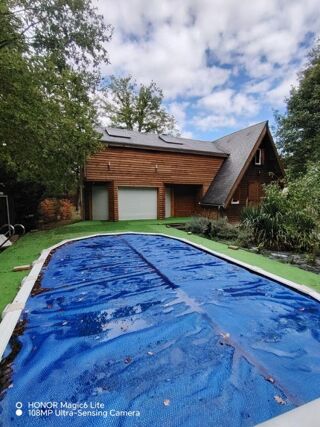 Vente Maison PEZOU 41, joli chalet spacieux dans un cadre exceptionnel avec piscine Pezou