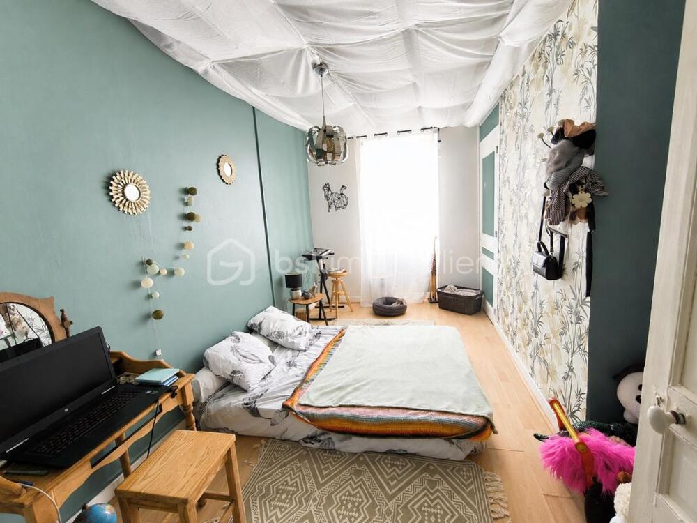 Maison de bourg en pierre rénovée de 70m2  en plein coeur de Saint-Victurnien