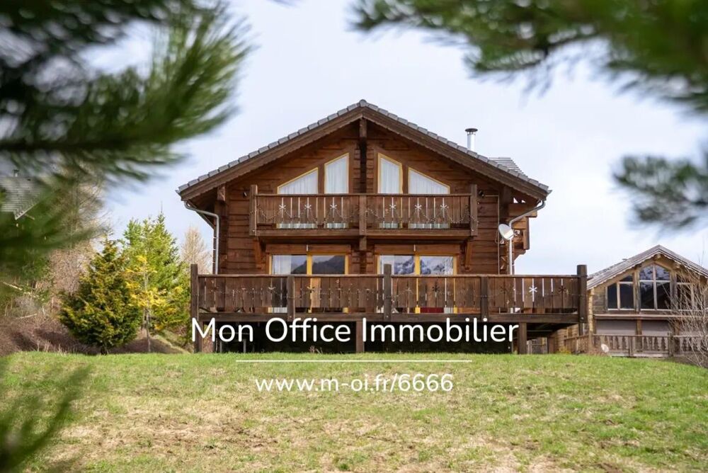 Référence : 6666-CLG. - Chalet de type 7 en madrier de 240m² sur une parcelle de 1500m² à La Joue du Loup
