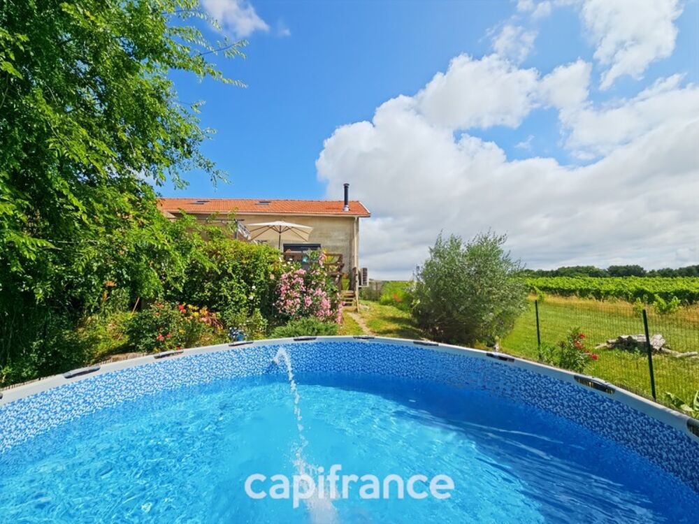 A Cézac, jolie maison en pierre rénovée, terrain de 447m², piscine