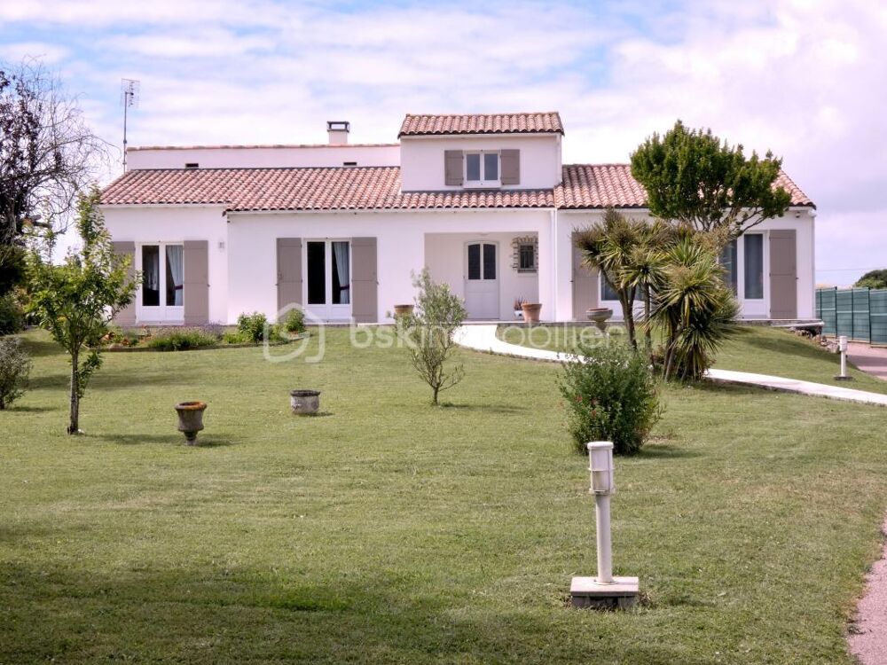 Maison familiale lumineuse, 4 chambres, garage, parc arboré, à proximité des commerces et à 15 min de locéan