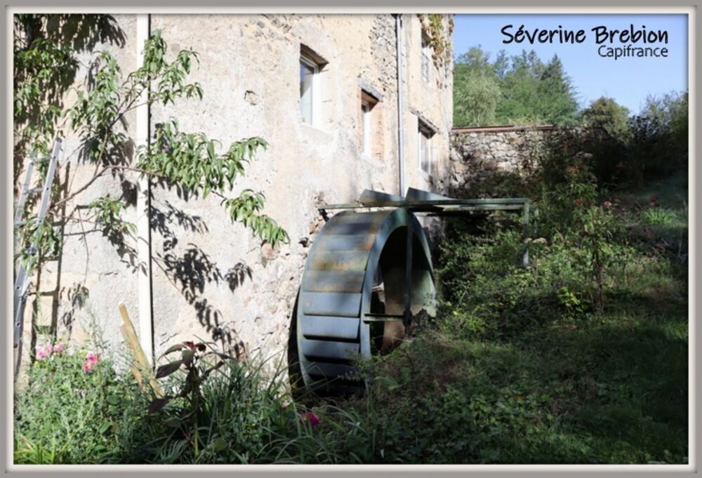 Vente Maison ? Maison rénovée en pierre de 166 m², 4 chambres, vaste séjour, dépendance, assainissement OK, avec ancien moulin et terrain de Saint remy sur durolle