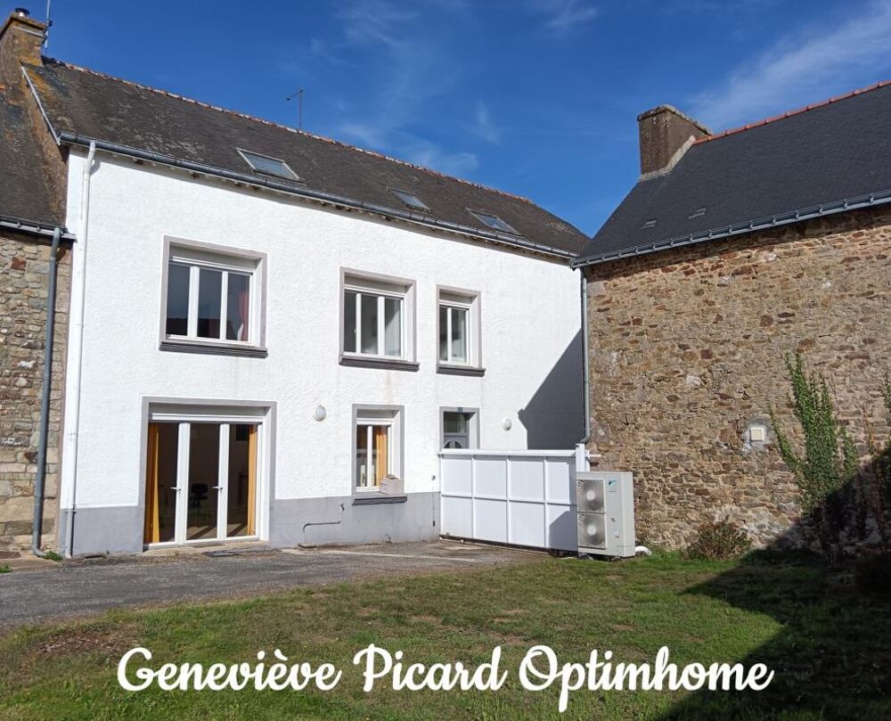 Maison de caractère en pierre de 189 m²  5 chambres, dépendance et cour en coeur de bourg