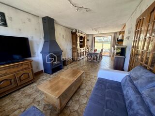 Vente Maison Maison 5 pièces avec véranda, sous-sol complet, grand garage et jardin La grandville