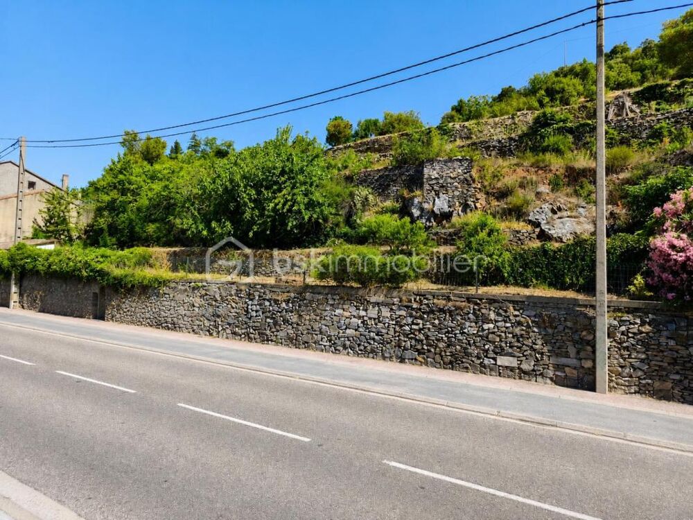 MAISON DE VILLAGE AVEC TERRAIN - TERRASSE ET GRAND GARAGE