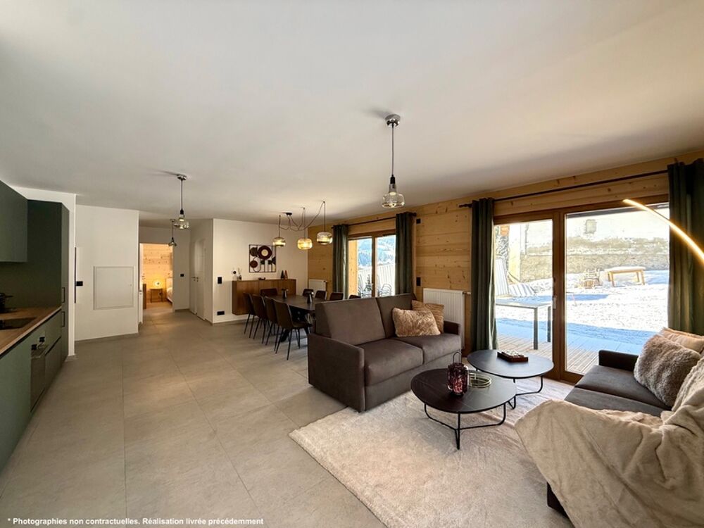 À vendre  Magnifique appartement T4 en duplex de 110,76 m² habitables (127 m² au sol), situé au dernier étage, au coeur du villa